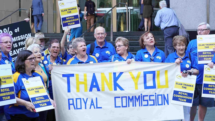 A group of people from Care Leavers Australia Network hold a sign saying "Thank you Royal Commission".