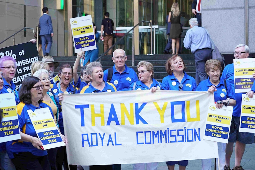 A group of people from Care Leavers Australia Network hold a sign saying "Thank you Royal Commission".