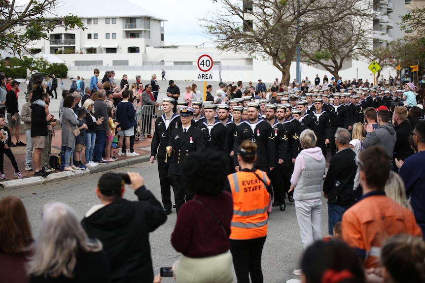 A wide shot of the parade.