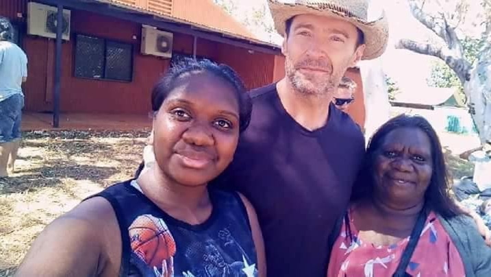 Hugh Jackman poses with Bidyadanga residents during a recent visit to the community.