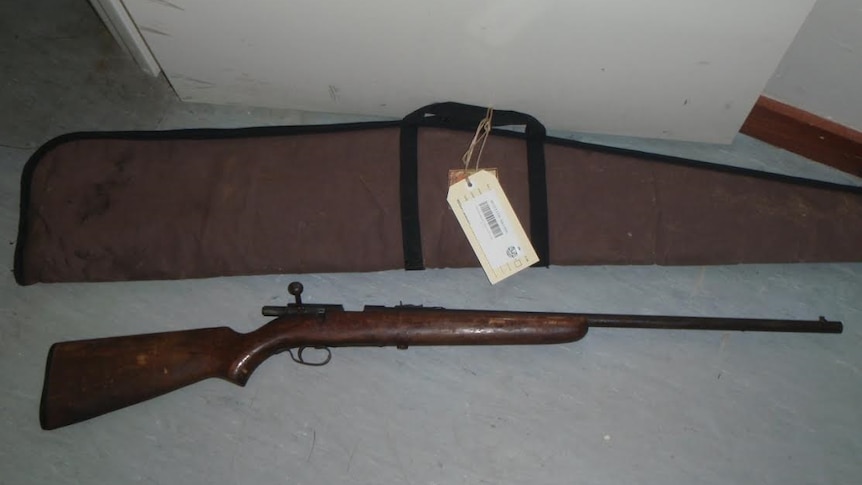 An old .22 rifle and case.