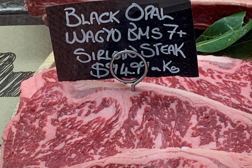 Photo of wagyu beef on a butcher shop shelf