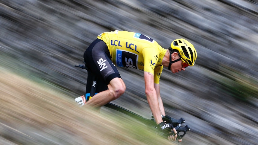 Team Sky rider Chris Froome descends on a stage of the 2015 Tour de France