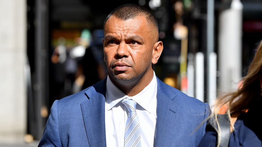 Kurtley Beale outside court wearing a shirt and tie