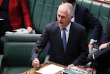 Malcolm Turnbull with a clenched fist speaking in Question Time