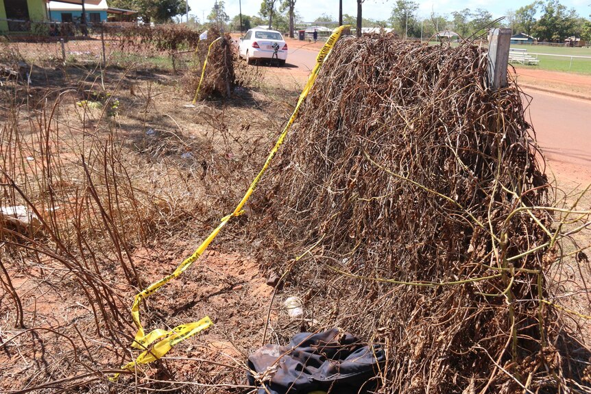 Asbestos warning tape left behind on a demolition site in Galiwin'ku.