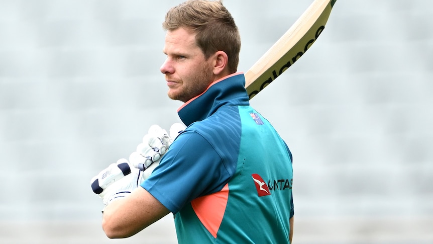 Steve Smith holds his bat on his shoulder