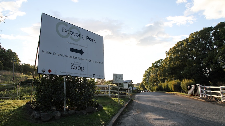 The front sign and gate of the Booyong Pork plant.