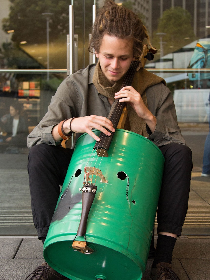 Cellist Nils Hobiger plays an oil drum cello