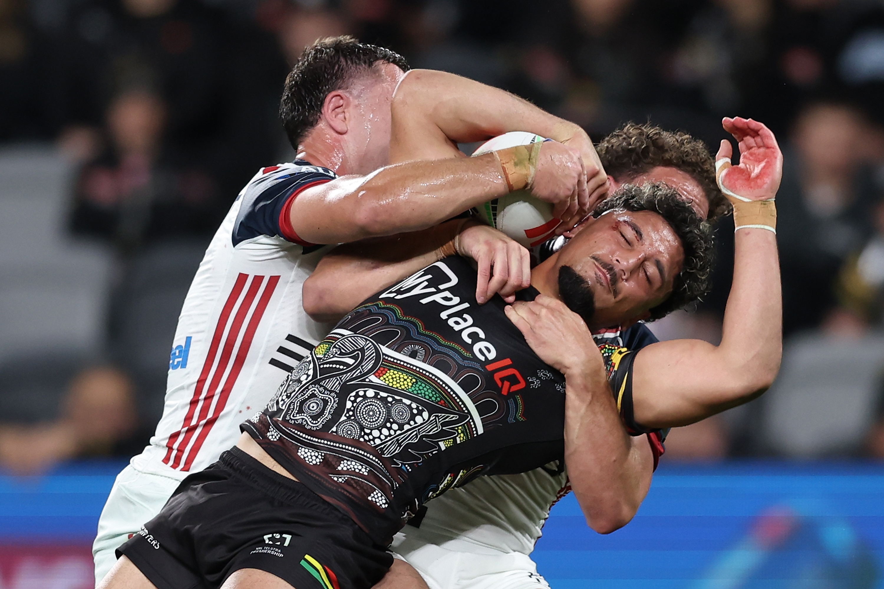 Live: Panthers and Roosters locked in tight heavyweight battle