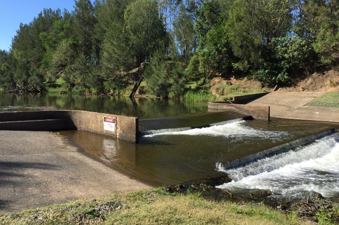 Water flowing over the weir at Gympie.