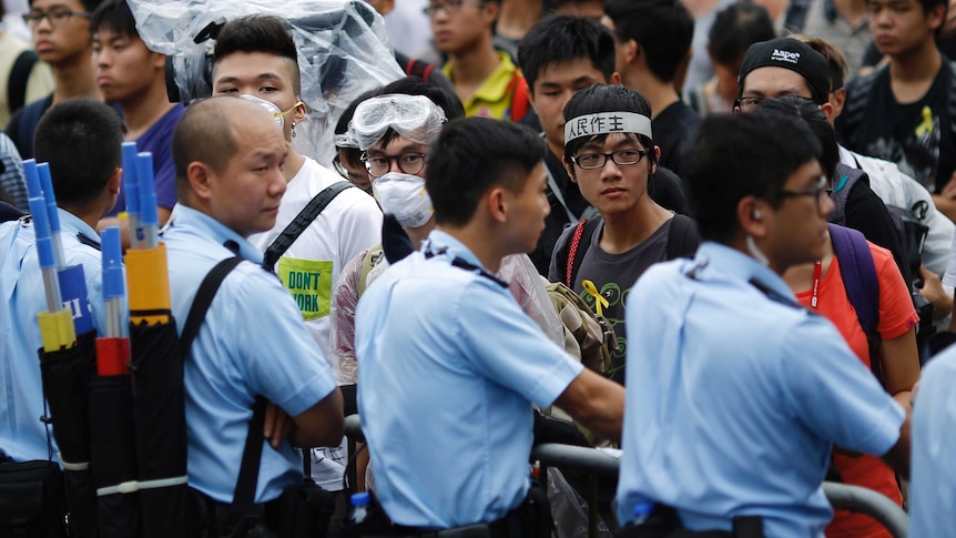 Protesters block the entrance to government buildings in Hong Kong