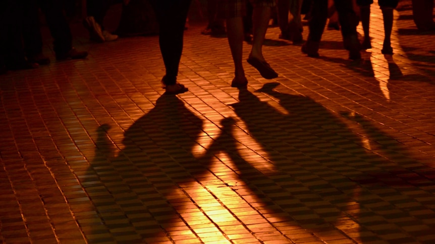 Shadow of a couple holding hands