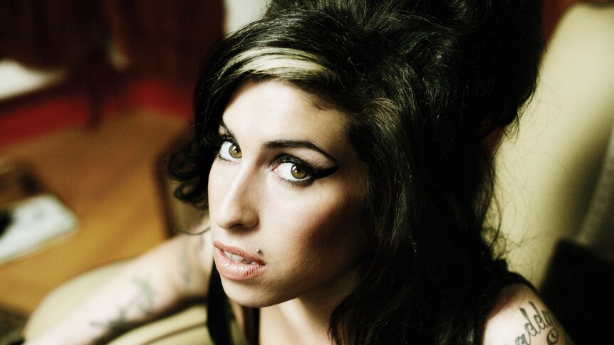 An up-close photo of the late British soul singer Amy Winehouse