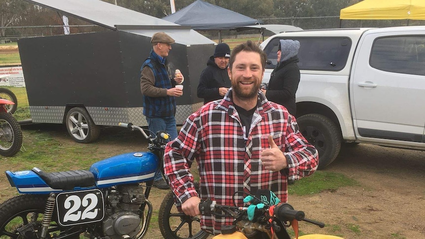 Electrician Trent Harmer with mates and motorbike for story on binge drinking in regional Australia