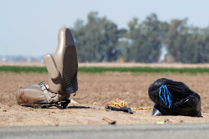 A car seat is seen at the scene of the collision