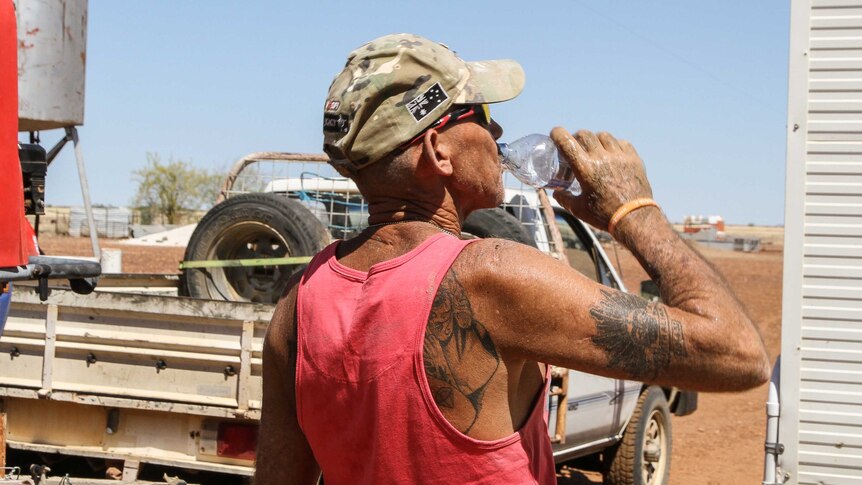 Veteran drinking water at Goolma Station