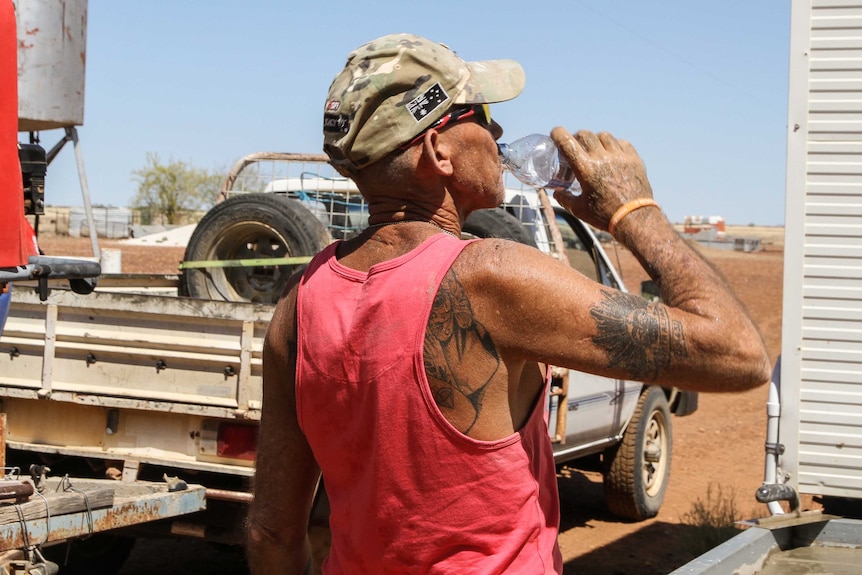 Veteran drinking water at Goolma Station