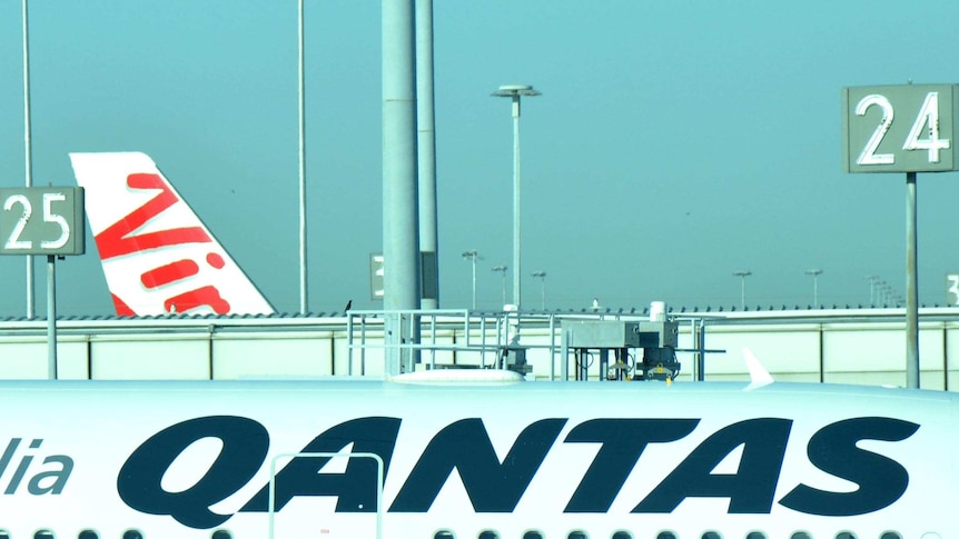 Qantas and Virgin planes on the tarmac