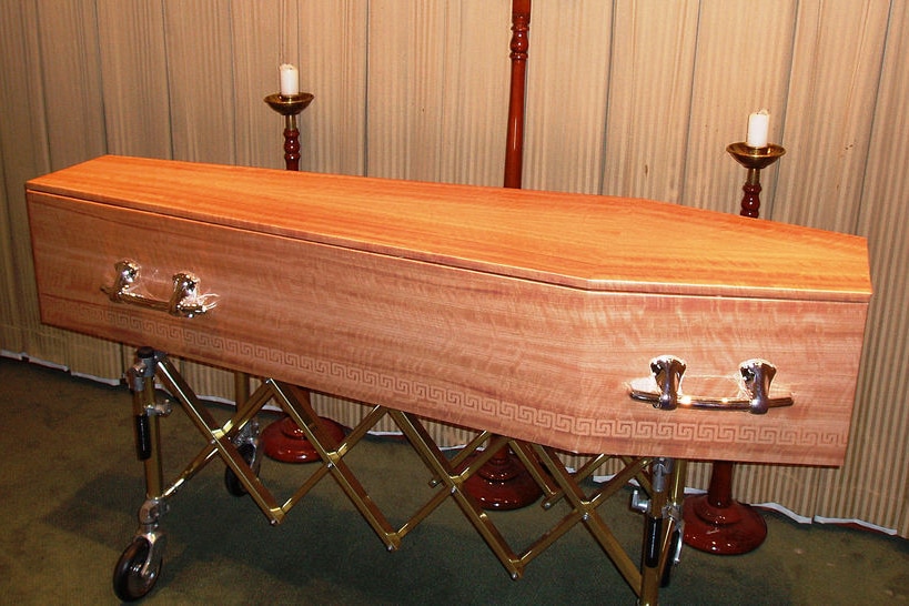 A cardboard funeral casket