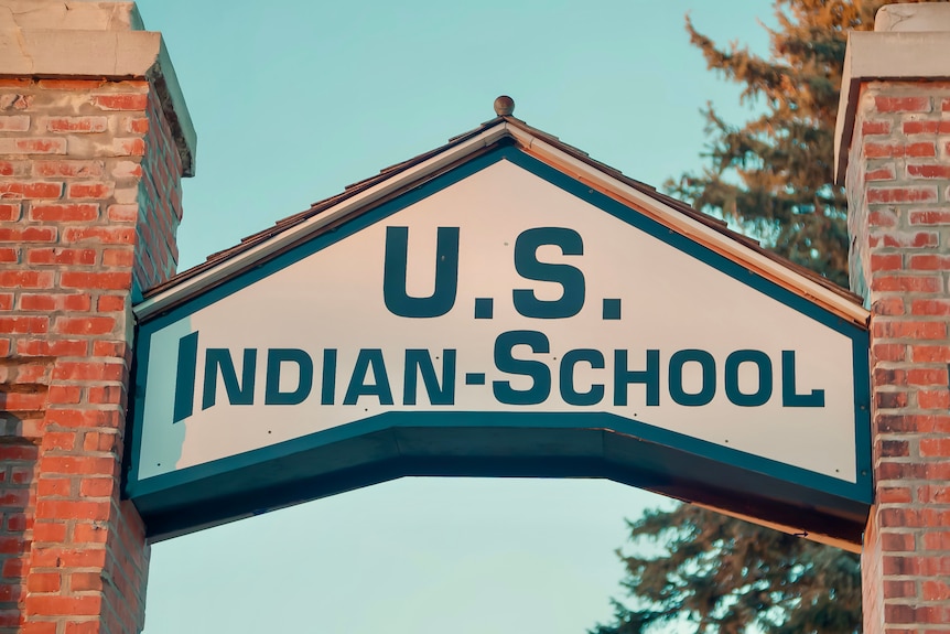A sign reading U.S. Indian School.
