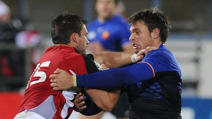 Tough contest ... Canada full-back James Pritchard (L) vies with France wing Vincent Clerc (AFP Photo: Franck Fife)