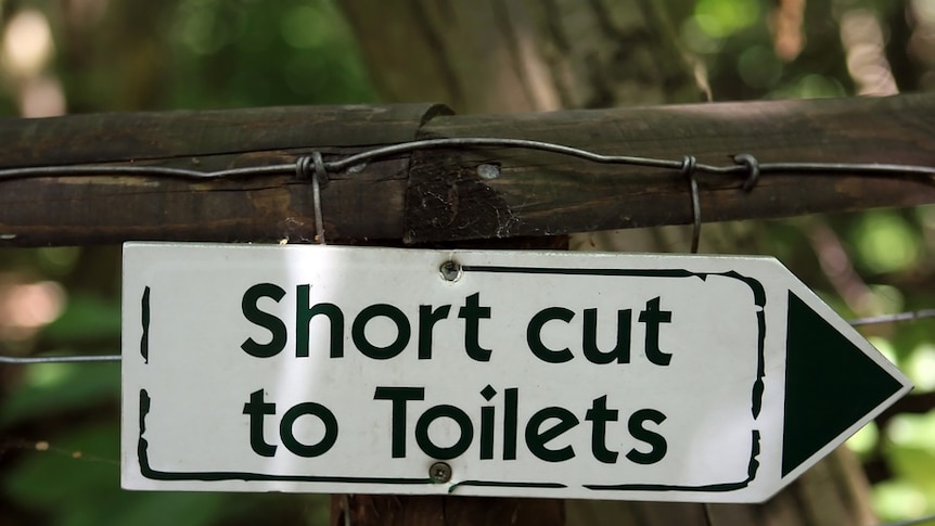 'Short cut to toilets' sign