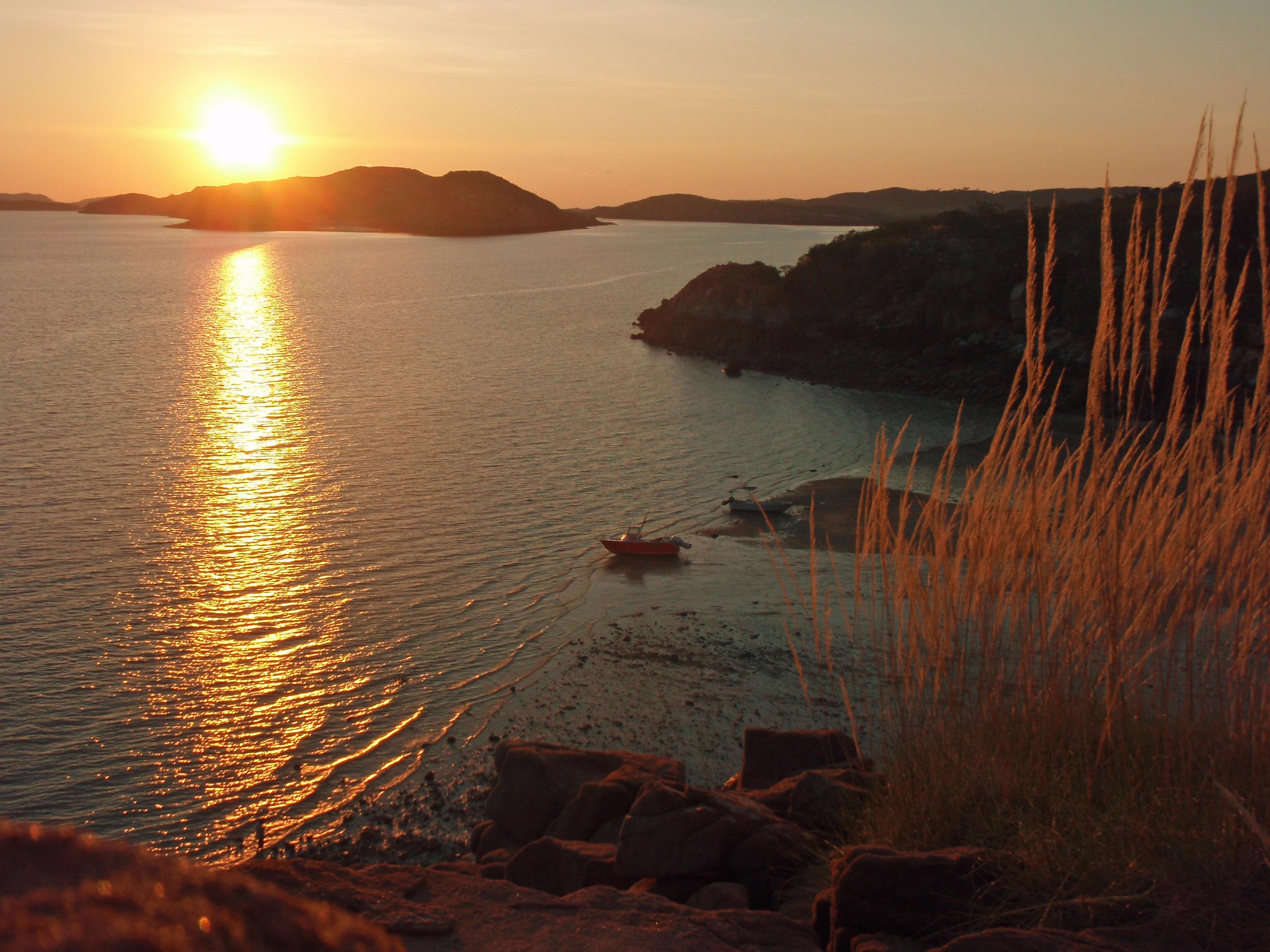 Sunset over a bay and islands.