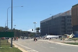 Kawana Way remained closed on Saturday morning as authorities examined the water tower wreckage