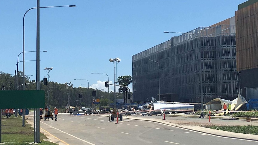 Kawana Way remained closed on Saturday morning as authorities examined the water tower wreckage