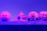 Human-like purple shapes enjoy a drink at a bar, while another shape sits alone without a drink to depict being left out at work