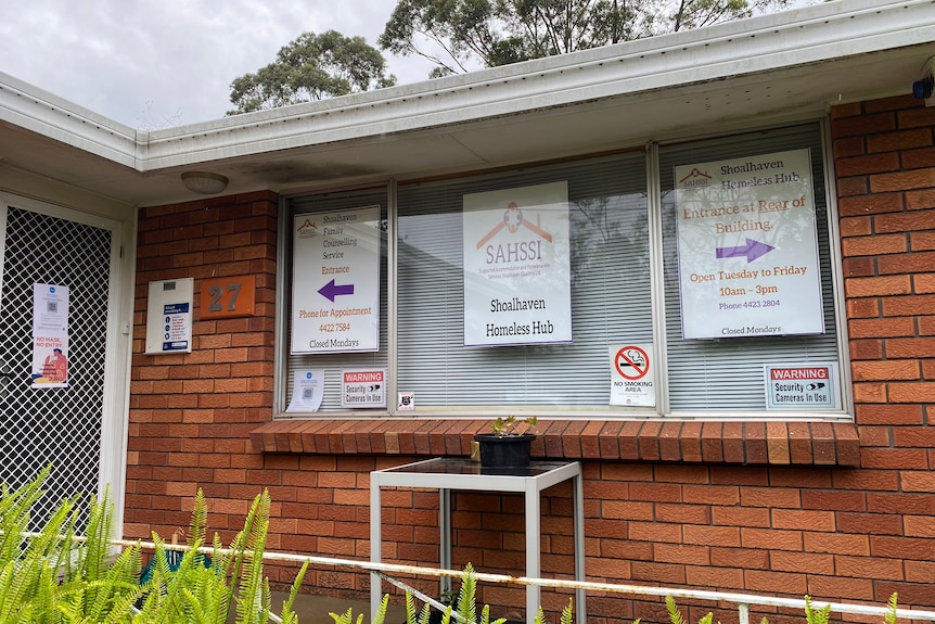 Homeless Hub signage on a window.