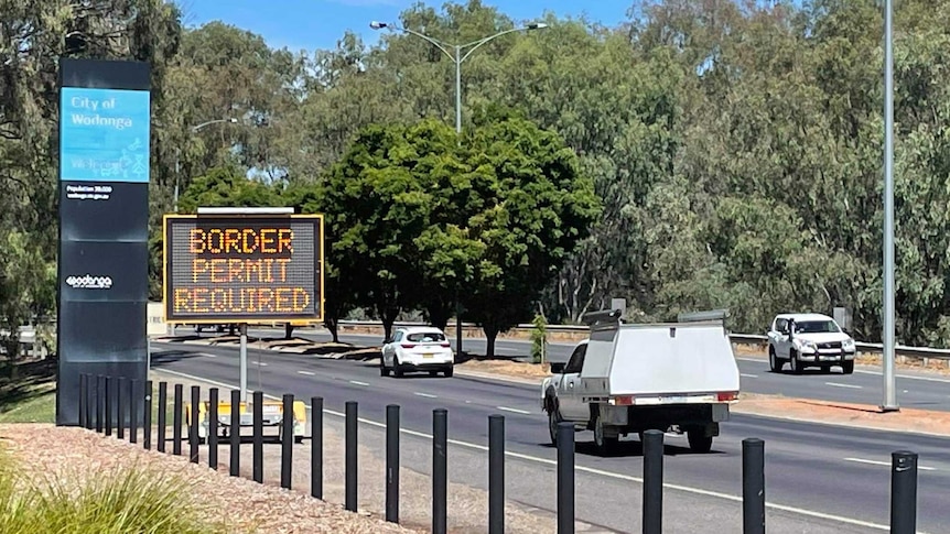 A sign at the Victorian border saying permits are required for entry.