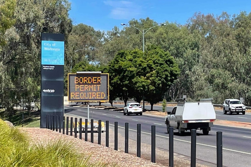 A sign at the Victorian border saying permits are required for entry.