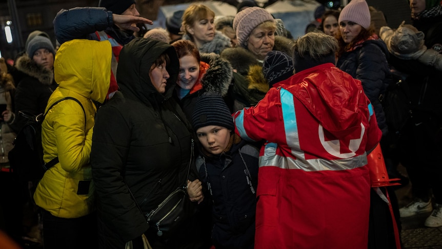 A crowd of women and children. 