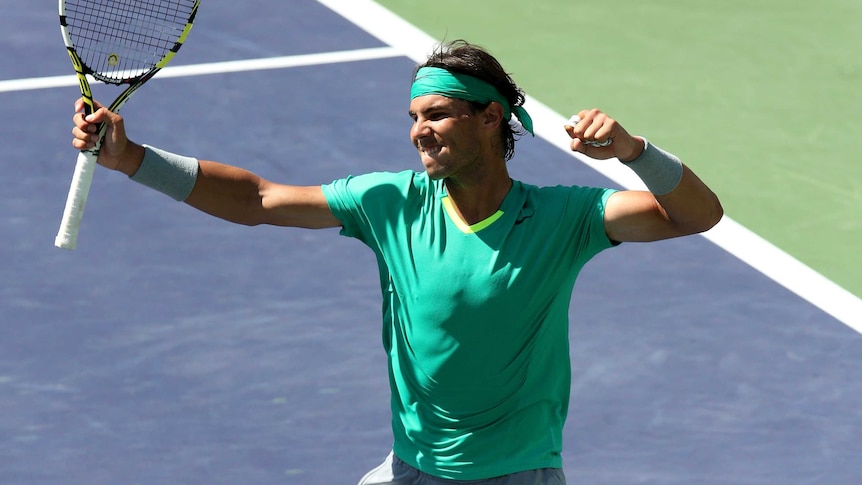 Spain's Rafael Nadal celebrates after beating Czech Tomas Berdych to reach the Indian Wells final.
