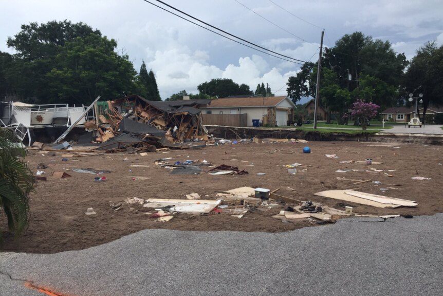 Florida sinkhole stretches up to 76 metres wide and 15 metres deep as it swallows a house