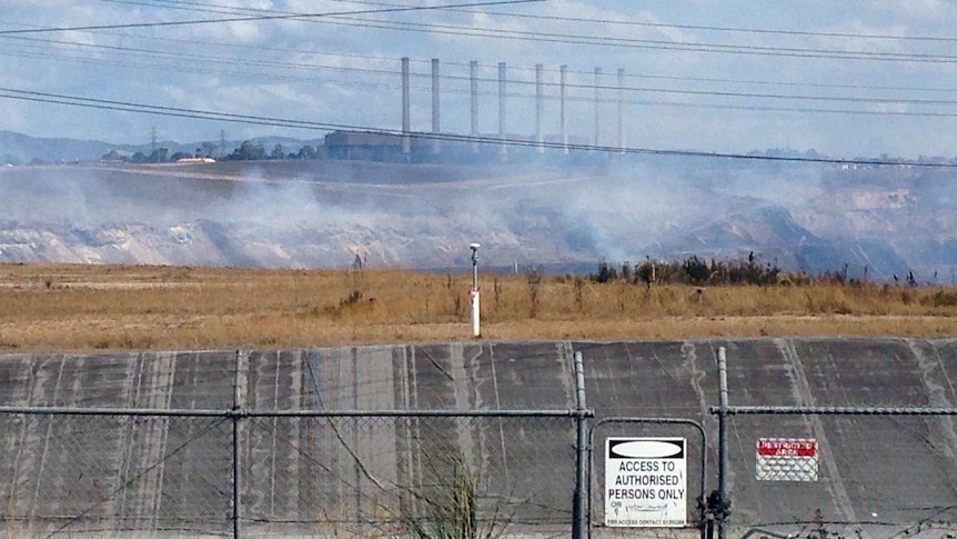 Wide shot of smoke and power lines in front of the Hazelwood power station on March 2, 2014.