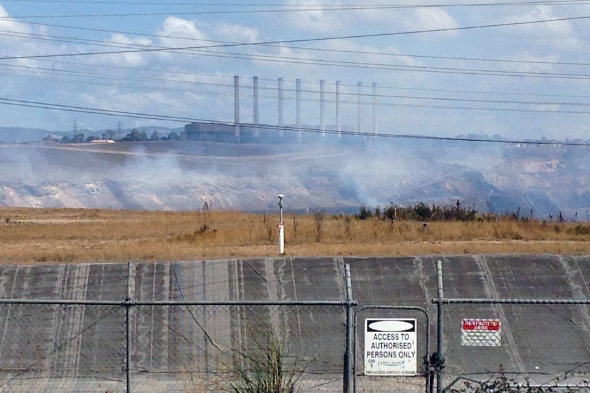 Wide shot of smoke and power lines in front of the Hazelwood power station on March 2, 2014.