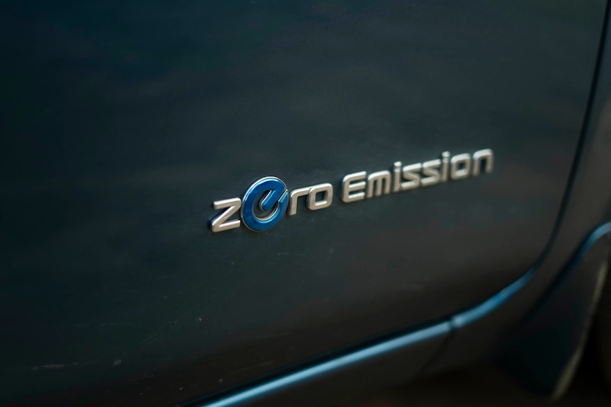 A sign on an electric car reads: zero emissions