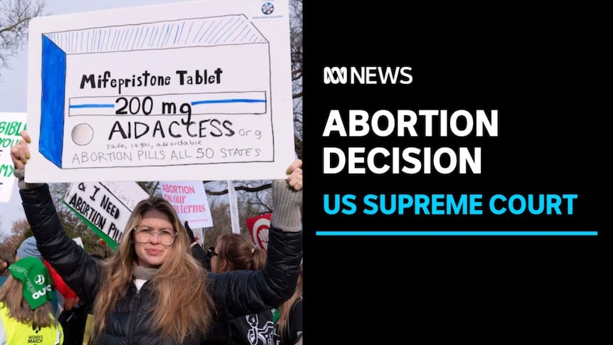 Abortion Decision, US Supreme Court: A woman holds up a protest sign at a pro-choice rally.