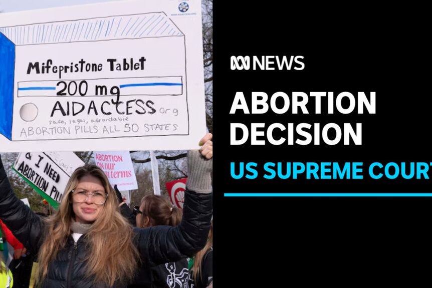 Abortion Decision, US Supreme Court: A woman holds up a protest sign at a pro-choice rally.