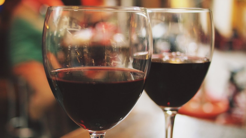 Two glasses of red wine.