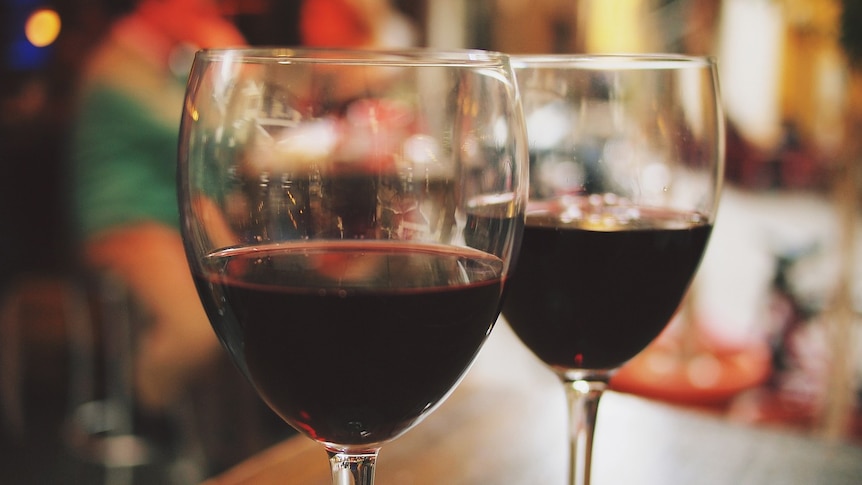 Two glasses of red wine.