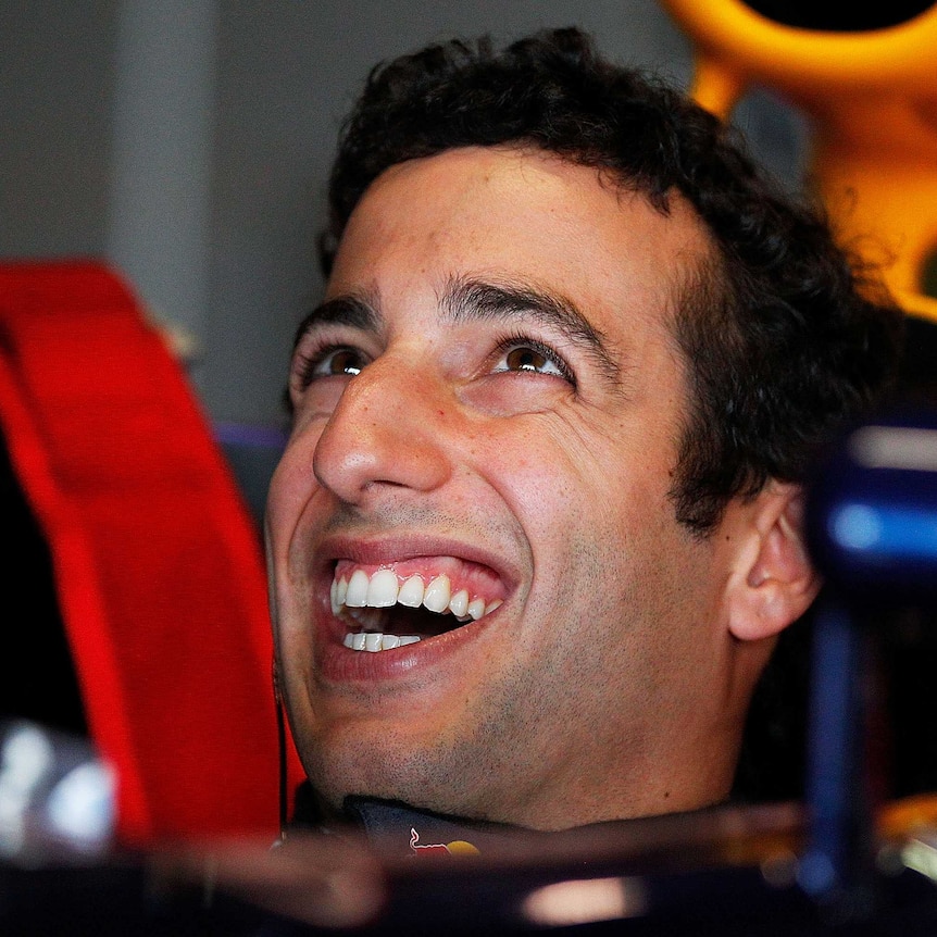Daniel Ricciardo smiles in the Red Bull cockpit