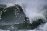 Justen Allport contesting the Cape Fear big wave surf contest