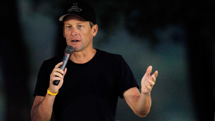 Lance Armstrong addressing a charity event in 2012.