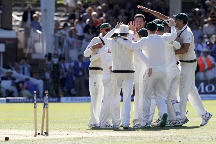 Josh Hazlewood (C) celebrates with team-mates after bowling out James Anderson at Lord's.