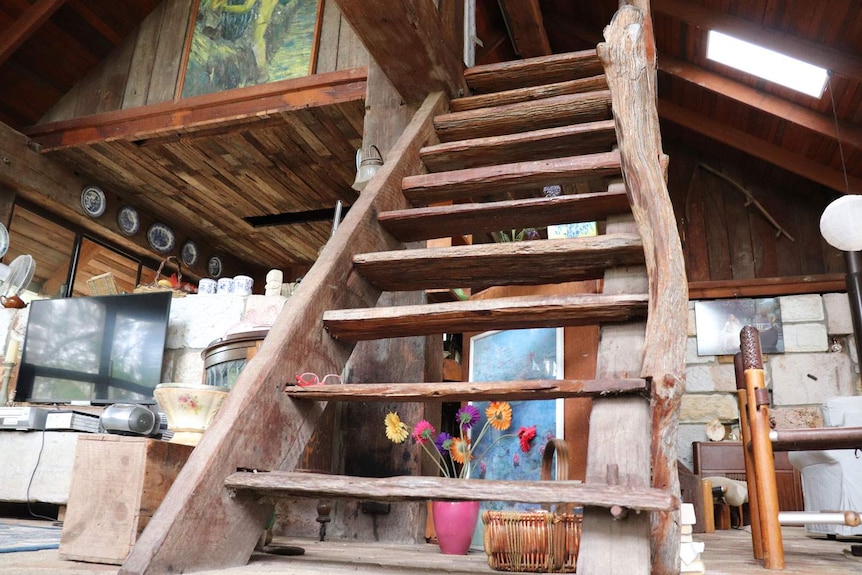 The staircase of the unique family home in January 2020 that Logan man Ken Aitken built on five acres in 1981.