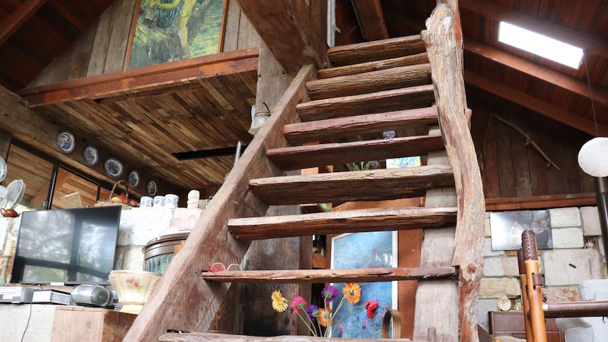 The staircase of the unique family home in January 2020 that Logan man Ken Aitken built on five acres in 1981.
